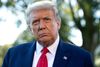 (FILES) In this file photo former US President Donald Trump speaks to the media prior to departing from the South Lawn of the White House in Washington, DC, September 21, 2020, as he travels to Ohio. - He's gone, he's golfing, but from his palm lined Florida hideaway Donald Trump is also plotting revenge. If many Americans - - perhaps discreetly including a number of senior Republicans - - wished Trump would just disappear at his Mar-a-Lago resort in Palm Beach, they're in for a sore disappointment.As an impeachment trial clanks into gear in Washington, the disgraced ex-president is making clear to Republican senators that they need to remember he is a major force. An announcement on January 25, 2021 that he was opening "the Office of the Former President" in his new hometown reminded them. (Photo by SAUL LOEB / AFP)