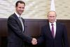 Under deres møde roste de to statsledere, Syriens præsident, Bashar al-Assad (tv.), og Ruslands præsident, Vladimir Putin, hinanden for et godt samarbejde i kampen mod terrorisme i Syrien. Foto: Mikhail Klimentyev/AP