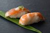 De perfekte ris er både faste og bløde. Til højre ses en dårlig nigiri.