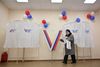 A woman walks to cast her ballot at a polling station during the presidential election in Rostov-on-Don, Russia, March 15, 2024. REUTERS/Sergey Pivovarov