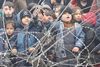Antallet af illegale migranter ved den polske grænse steg til 8.000 i 2021 fra færre end 1.000 de foregående to år. På billedet ses børn af migranter ved den polske grænse nær byen Kuznica. Foto: Reuters