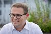 Minister for natur og dyrevelfærd Christian Rabjerg Madsen (S) fotograferet på taget af ministeriet.