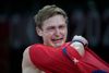 Badmintonspilleren Viktor Axelsen efter finalesejren over Chen Long ved OL i Tokyo. Axelsen skal forsøge at gentage bedriften i Paris som en af i alt 135 danske atleter. Arkivfoto: Markus Schreiber/AP/Ritzau Scanpix