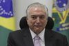 Michel Temer har været gennem et sandt stormvejr, efter at mediet O Globo opsnappede en lydoptagelse, hvor præsidenten angiveligt beordrer et parlamentsmedlem til at bestikke et hovedvidne i Brasiliens største korruptionsskandale. Foto: Eraldo Peres/AP