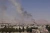 Krigshandlingerne i Syrien – her Damaskus-forstaden Douma – har fået millioner af syrere til at flygte, især til Jordan og Libanon. Disse lande kan simpelthen ikke håndtere flere flygtninge, som derfor søger videre til Europa. Foto: Shaam News Network/AP