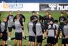 Landstræner Kasper Hjulmand taler med spillerne på sin første træningsdag. Yderst til højre stikker assistenttræner Morten Wieghorst snuden frem. Foto: Jens Dresling