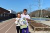 Astrid Wierzba og Simon Anker-Møller Fisker er hovedkræfterne bag den nye kollegieturnering i det nordlige Aarhus. Her står de med plakaten til arrangementet.