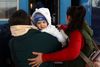 Ukrainian refugees board a train, bound to Krakow at Przemysl Glowny train station, after fleeing the Russian invasion of Ukraine, Poland, March 24, 2022.REUTERS/Hannah McKay