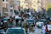 Jihadister fra Islamisk Stat i parade i det selvudråbte kalifat Raqqa, som siden foråret 2013 har været under IS' kontrol. Arkivfoto.