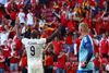 Belgium's forward Romelu Lukaku (L) celebrates after his team's second goal during the UEFA EURO 2020 Group B football match between Denmark and Belgium at the Parken Stadium in Copenhagen on June 17, 2021. (Photo by WOLFGANG RATTAY / POOL / AFP)