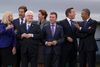 Et muntert øjeblik under Nato-topmødet i Wales fredag. Fra venstre statsminister Helle Thorning-Schmidt, Hollands premierminister Mark Rutte, Kroatiens præsident Ivo Josipovix, Sloveniens premierminister Alenka Bratusek, Nato-generalsekretær Anders Fogh Rasmussen, Storbritanniens premierminister David Cameron og USA's præsident Barack Obama.