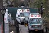 I New York City alene er 4571 mennesker døde som følge af coronavirus. Her ses ambulancer foran et felthospital, der er etableret i byens berømte Central Park på Manhattan, onsdag. Foto: Mike Segar/Reuters