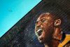 Kobe Bryant spillede i to årtier for holdet Los Angeles Lakers. Her er han portrætteret på en mur i Los Angeles. Foto: Apu Gomes/AFP