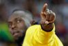 Usain Bolts sædvanlige positur - lynet - er kendt af alle sportsinteresserede. Det kommer man næppe til at se på en fodboldbane. Foto: AP/Matthias Schrader