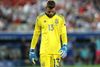 David de Gea er en levende keeper og i stand til at redde sit hold ene mand, men ikke mod Kroatien. Her forlader den spanske målmand nedbøjet banen efter nederlaget til kroaterne. Foto: Hassan Ammar