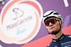 Team Corendon - Circus' Mathieu van der Poel of Netherlands stands on the podium prior to take the start, from the Maspes-Vigorelli velodrome in Milan, of the 113th Milan-San Remo one-day classic cycling race, on March 19, 2022 between Milan and San Remo, northern Italy. (Photo by Marco BERTORELLO / AFP)