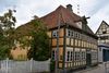 Den nye udstilling i Den Gamle By viser blandt andet en børstebutik og et fattigt hjem fra mellemkrigsårene. Pressefoto