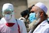 epa08344332 Afghan health workers prepare to spray disinfectants at public places in Helmand, Afghanistan, 05 April 2020. Countries around the world are taking increased measures to stem the widespread of the SARS-CoV-2 coronavirus which causes the COVID-19 disease. EPA/WATAN YAR