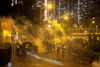 Anti-government protesters run away from a tear gas canister, after leader Carrie Lam announced emergency laws that would include banning face masks at protests, in Wong Tai Sin district, in Hong Kong, China October 4, 2019. REUTERS/Athit Perawongmetha