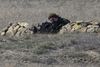 En russisk soldat - her i forbindelse med en blokade ved den ukrainsk flådebase i byen Novoozerne, som ligger 91 kilometer vest for Simferopol.