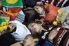 Sengetid på færgen fra Lesbos til Athen. Her er en familie gået omkuld på færgens dæk. Foto: Niels Hougaard