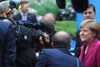 Den tyske kansler, Angela Merkel, møder pressen i forbindelse med et G7-møde i Bruxelles sidste år. Arkivfoto: Yves Logghe/AP