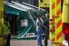 Medical staff are seen outside the NHS Nightingale Hospital at the Excel Centre in London as the spread of the coronavirus disease (COVID-19) continues, London, Britain, April 11, 2020. REUTERS/Henry Nicholls