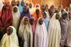 Med eskorte fra den nigerianske hær ankom de 105 piger til Dapchi i fem busser omkring klokken 14.30 søndag. Foto: AP/Azeez Akunleyan