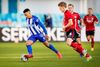 Den tidligere AGF-spiller Tobias Sana (til venstre) - her i nærkamp med en anden tidligere AGF'er Jens Stage - var tæt på at gøre aftenen til et mareridt for FC København, der dog hev sejren i land med to scoringer i det sidste kvarter. Foto: Björn Larsson/AFP