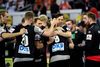 Tysk jubel da en scoring i sidste sekund reddede et uafgjort resultat hjem. Foto: Monika Skolimowska/AP