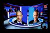 The results of the exit polls are shown on a screen at Benny Gantz's Blue and White party headquarters, following Israel's parliamentary election, in Tel Aviv, Israel, September 17, 2019. REUTERS/Amir Cohen