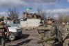 Henover den seneste uge har ukrainske soldater genvundet territorium navnligt vest for Kyiv. Her er det landsbyen Lukyanivka, der atter er under det blå og gule flag. Foto: REUTERS/Marko Djurica