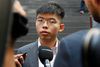 Prominent Hong Kong protester Joshua Wong is interviewed by journalists after he held a press conference at the Bundespressekonferenz, on September 11, 2019 in Berlin. - Joshua Wong had met Germany's Foreign minister the day before as he carried abroad his call to support the growing pro-democracy movement in the former British colony, a meeting slammed on by China as "disrespectful". (Photo by MICHELE TANTUSSI / AFP)