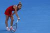 Simona Halep var på kanten af at vælte mod Angelique Kerber, men holdt sig lige akkurat kørende. Foto: Ng Han Guan/AP