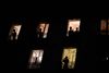 A 20h, plusieurs dizaines de parisiens sont sortis a leurs fenetres ou sur leurs balcons pour applaudir le personnel hospitalier qui lutte chaque jour contre l epidemie du covid 19 et qui se trouve en premiere ligne face au virus. At 8 p.m., several dozen Parisians came out to their windows or balconies to applaud the hospital staff who fight every day against the covid 19 epidemy and who are on the front line against the virus.//MERESSELOUISE_1120.3175/2003200842/Credit:Louise MERESSE/SIPA/2003200843