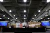 New York Governor Andrew Cuomo speaks in front of stacks of medical protective supplies during a news conference at the Jacob K. Javits Convention Center which will be partially converted into a temporary hospital during the outbreak of the coronavirus disease (COVID-19) in New York City, New York, U.S., March 24, 2020. REUTERS/Mike Segar