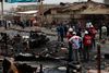 I maj dræbte to bilbomber over 100 mennesker i byen Jos. Andre angreb foregår med skydevåben, hvor uskyldige bliver mejet ned. Foto: Sunday Alamba/AP