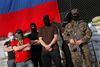 Maskerede og bevæbnede prorussiske separatister.