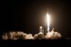 A SpaceX Falcon 9 rocket, with the Crew Dragon capsule, is launched carrying four astronauts on the first operational NASA commercial crew mission at Kennedy Space Center in Cape Canaveral, Florida, U.S. November 15, 2020. REUTERS/Thom Baur TPX IMAGES OF THE DAY