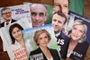 Magasiner med forsidefotos af en række af de førende kandidater i den franske valgkamp, der domineres af præsident Macron og Marine Le Pen. Her ses fra venstre mod højre Jean-Luc Mélenchon fra den ydre venstrefløj, socialisten Anne Hidalgo, den indvandrerkritiske og nationalistiske Eric Zemmour, den konservative Valerie Pecresse, præsident Emmanuel Macron, De Grønnes Yannick Jadot og Marine Le Pen. Foto: Nicolas Tucat/Ritzau Scanpix