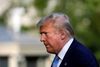 FILE PHOTO: U.S. President Donald Trump walks on the South Lawn of the White House upon his return to Washington, U.S., after a weekend in Bedminster, New Jersey, June 14, 2020. REUTERS/Yuri Gripas/File Photo