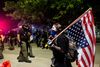 Efter fem dages protester i storbyen Minneapolis har urolighederne spredt sig fra kyst til kyst i USA. Her ses en situation fra byen Detroit. Foto: Matthew Hatcher/AFP