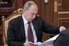 Et nyt lovforslag gør det langt lettere for den russiske stat og præsident Putin at klassificere uafhængige medier som propagandistiske. Arkivfoto: Alexei Druzhinin/Sputnik via AP