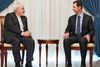 Irans udenrigsminister, Mohammad Javad Zarif, i samtale med den syriske præsident, Bashar al-Assad – selv om Syrien ikke er så vigtigt for Iran som Irak, er det stadig meget vigtigt. Arkivfoto: Sana/AP