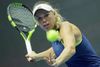 Torsdag kæmpede Wozniacki sig forbi italieneren Sara Errani, der som de fleste italienere føler sig bedst tilpas på grus. Foto: Dmitri Lovetsky/AP