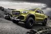Mercedes havde to udgaver med til pressemødet. En hvid model til byen og denne gule basse med kæmpe knopdæk og spil. Foto: PR