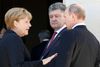 Angela Merkel, Vladimir Putin og den ukrainske præsident, Porosjenko, skal mødes fredag morgen, hvor de skal diskutere fredsplanen for Ukraine.