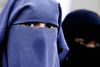 De Konservative støttede i første omgang Dansk Folkepartis besultningsforslag om et burkaforbud, men afviser det nu efter at være blevet en del af regeringen. Arkivfoto: AP