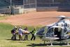 In this frame grab from a video courtesy of Horatio Gates recorded on August 12, 2022, Salman Rushdie is seen being loaded onto a medical evacuation helicopter near the Chautauqua Institution after being stabbed in the neck while speaking on stage in Chautauqua, New York. - Rushdie, whose controversial writings made him the target of a fatwa that forced him into hiding, was stabbed in the neck by an attacker on stage Friday in western New York state, according to New York State Police. The attacked is in custody. (Photo by Handout / AFP) / RESTRICTED TO EDITORIAL USE - MANDATORY CREDIT "AFP PHOTO / HORATIO GATES" - NO MARKETING NO ADVERTISING CAMPAIGNS - DISTRIBUTED AS A SERVICE TO CLIENTS