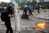 Hongkong er igen lørdag blevet ramt af voldsomme gadekampe mellem demonstranter og politi. Foto: Kai Pfaffenbach/Reuters